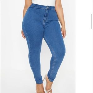 Plus Mid Wash High Rise Skinny Jeans